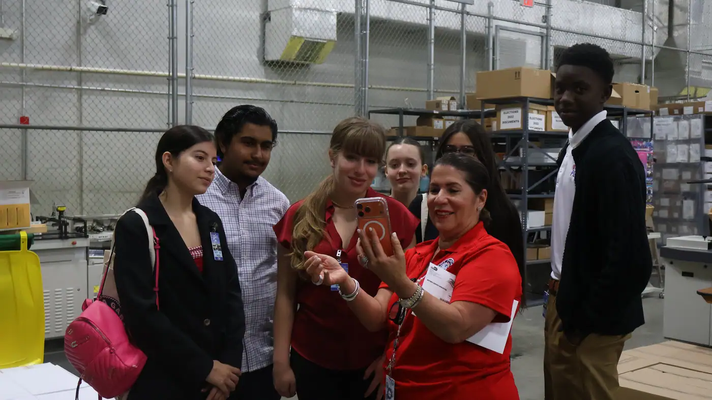 Elections staff walk the team through the chain of custody for ballots.